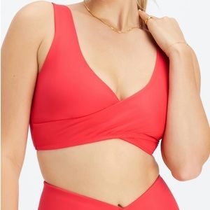 Fabletics Low Impact Crossover Sports Bra in Strawberry Red (S)